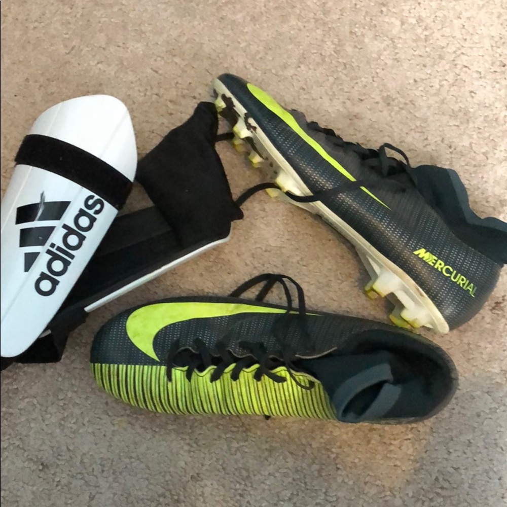 Used soccer cleats and shin guards
